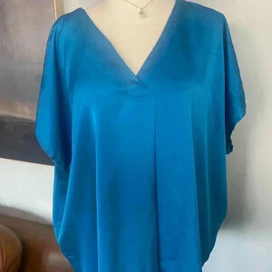 Women’s Ee:some turquoise large blouse Size L.